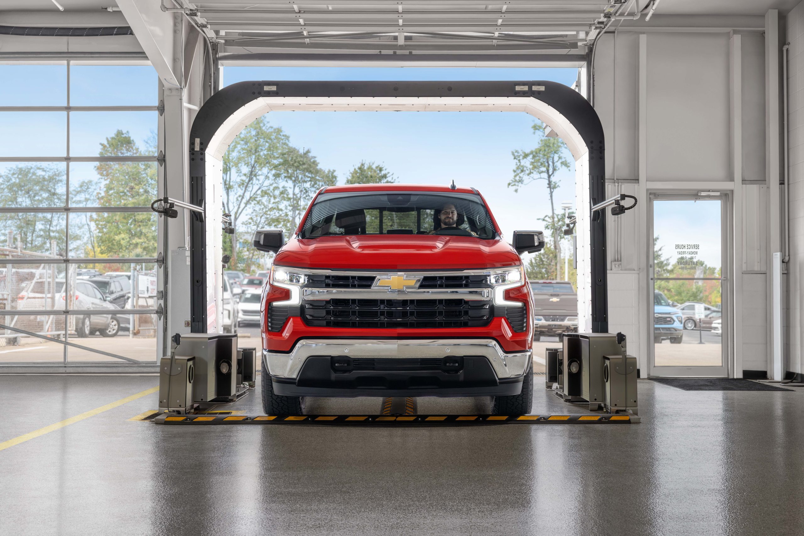 Red Silverado getting a car wash